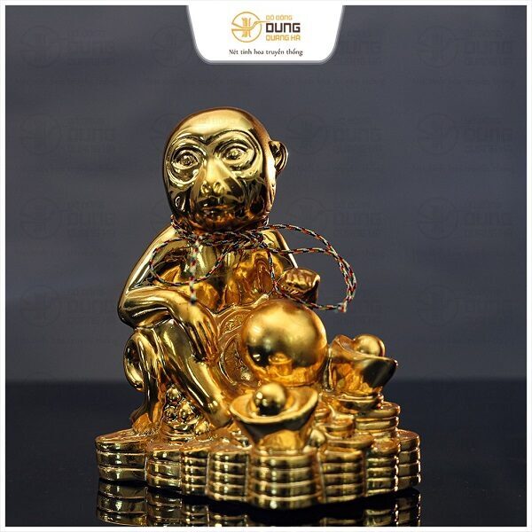 Tượng khỉ bằng đồng ngồi trên chồng tiền mạ vàng cao 15cm