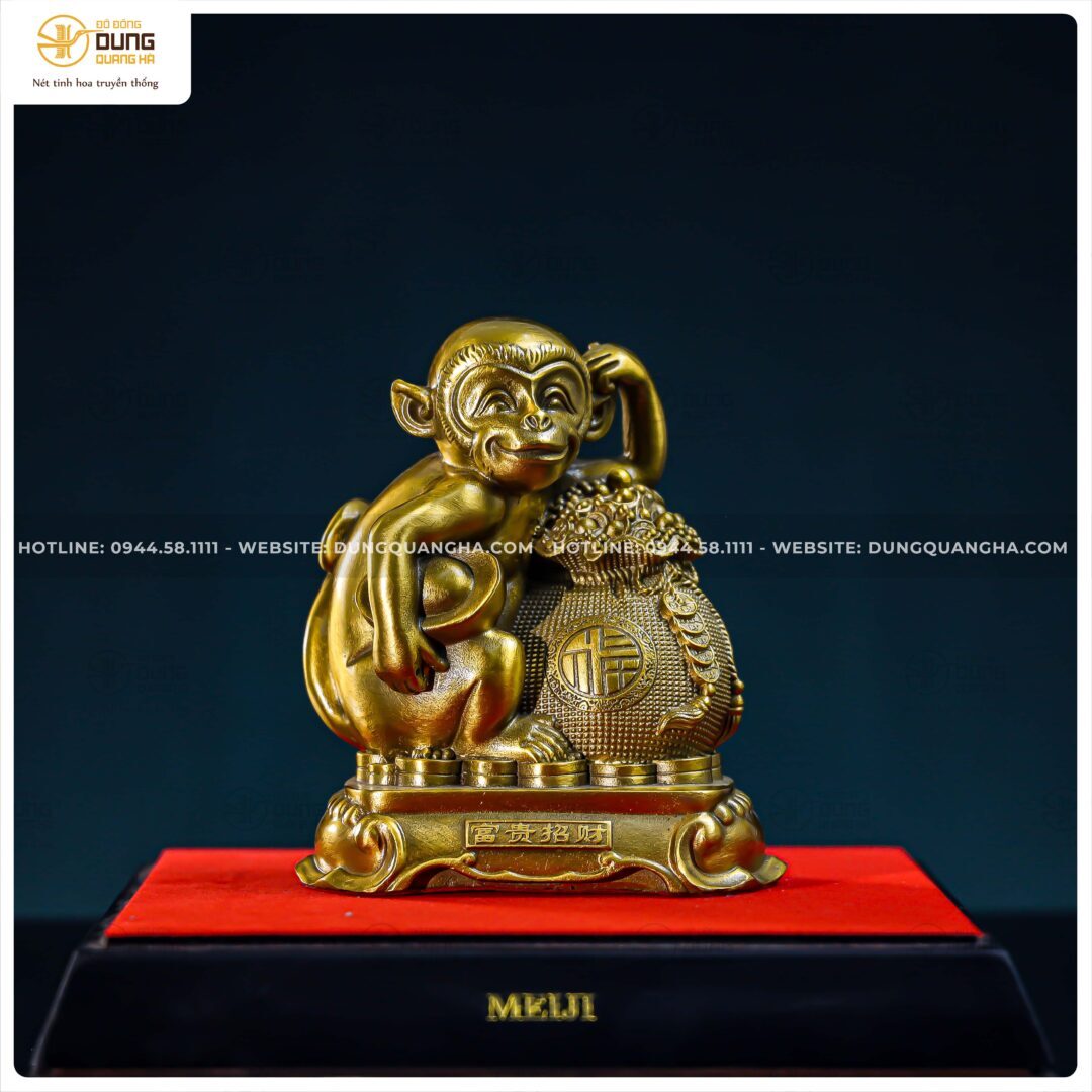 Tượng khỉ ngồi bên hũ vàng bằng đồng vàng kích thước 14x16cm